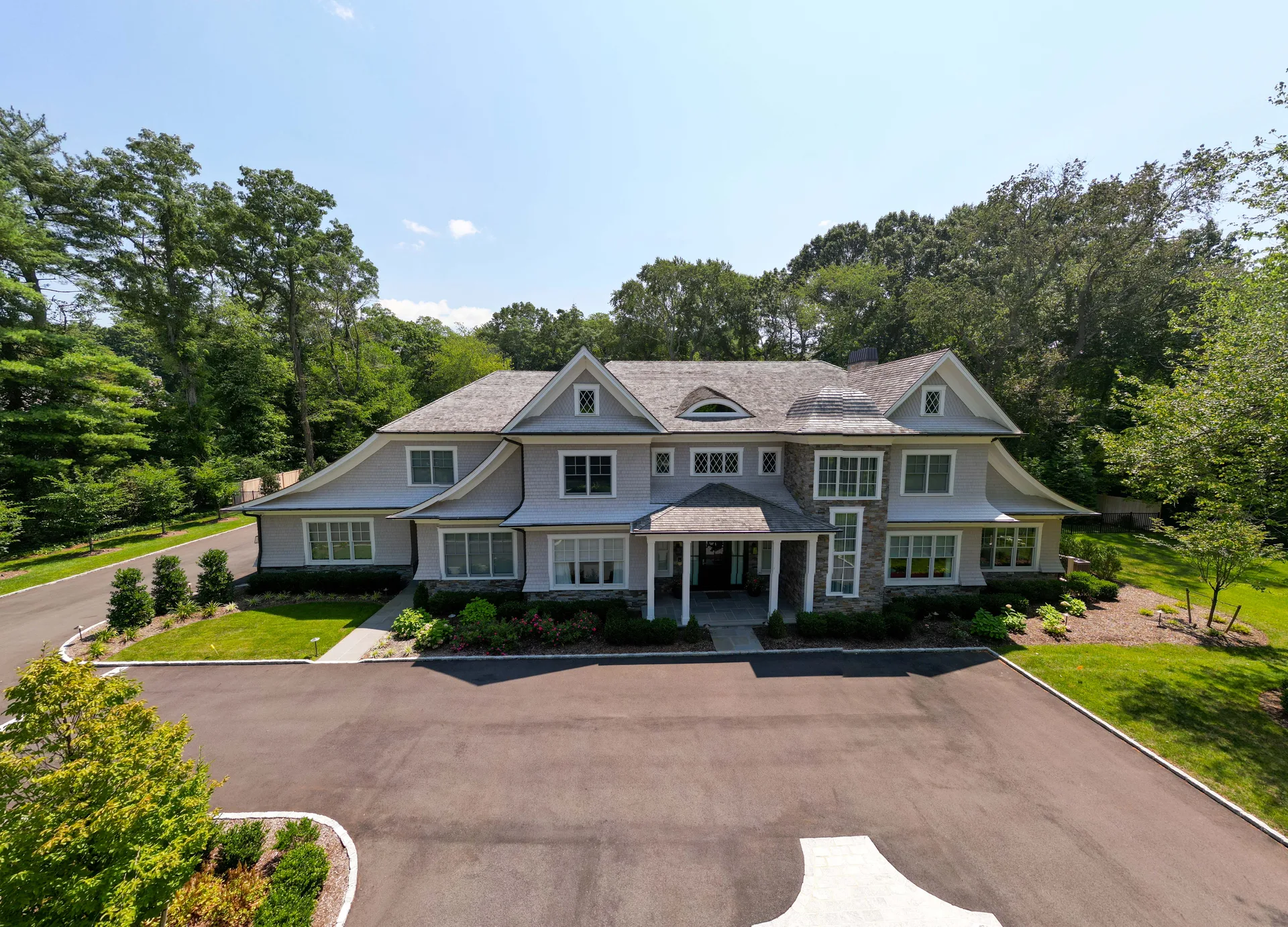Brookville Cedar Estate from above (portfolio project B): the full front elevation, the drive and the grounds