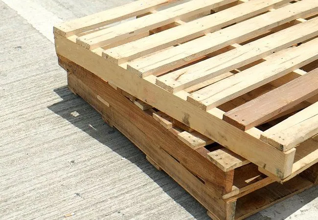 New wood pallets stacked outdoors