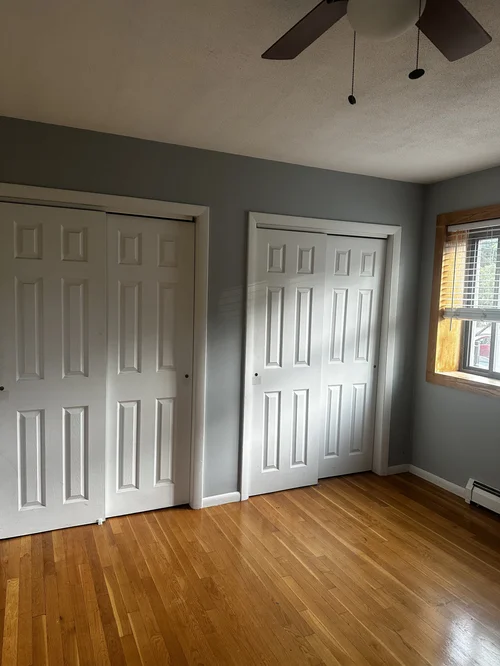 Interior painting project with painter working inside a home