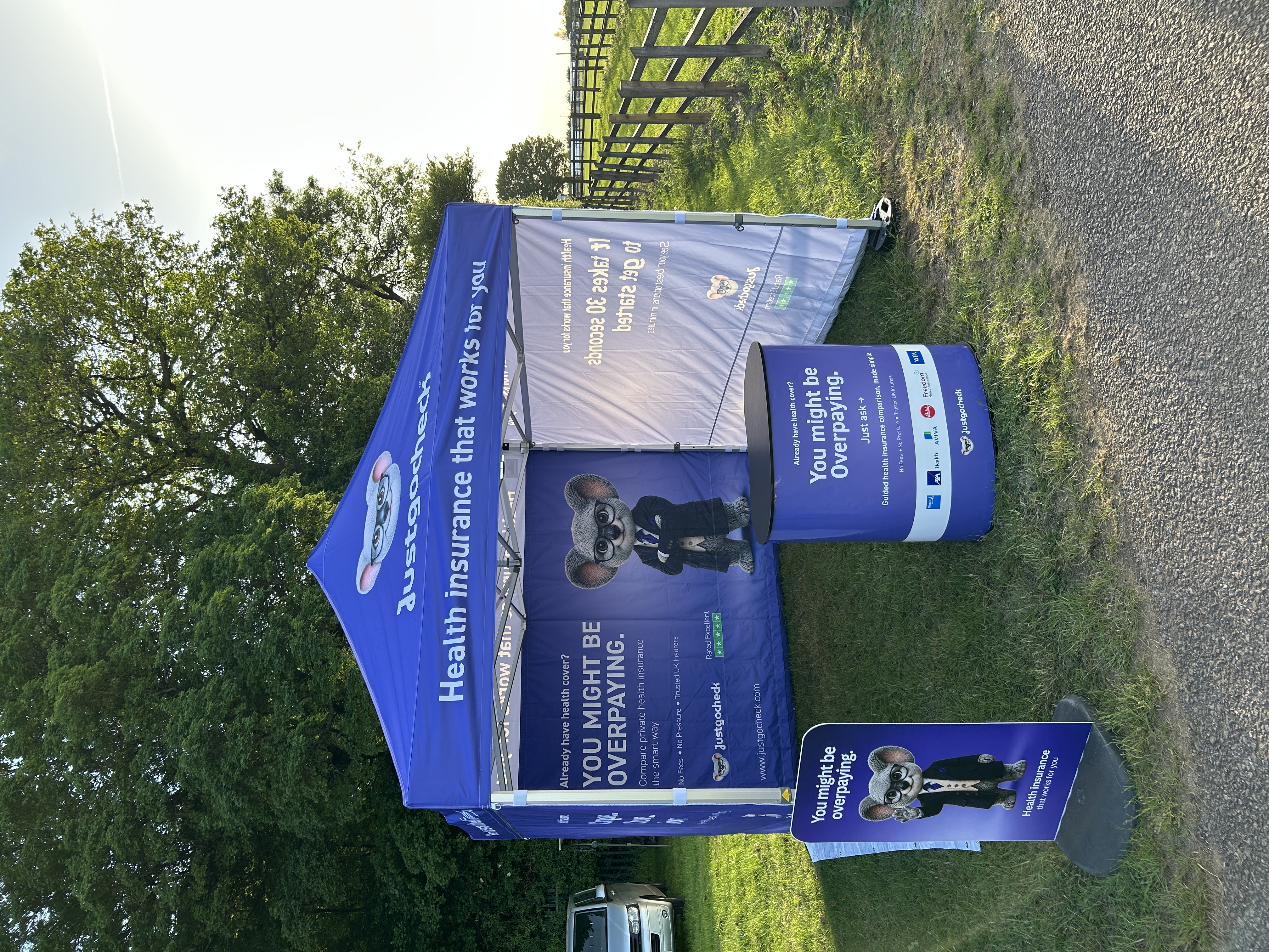 Just Go Check health insurance stand at a UK show