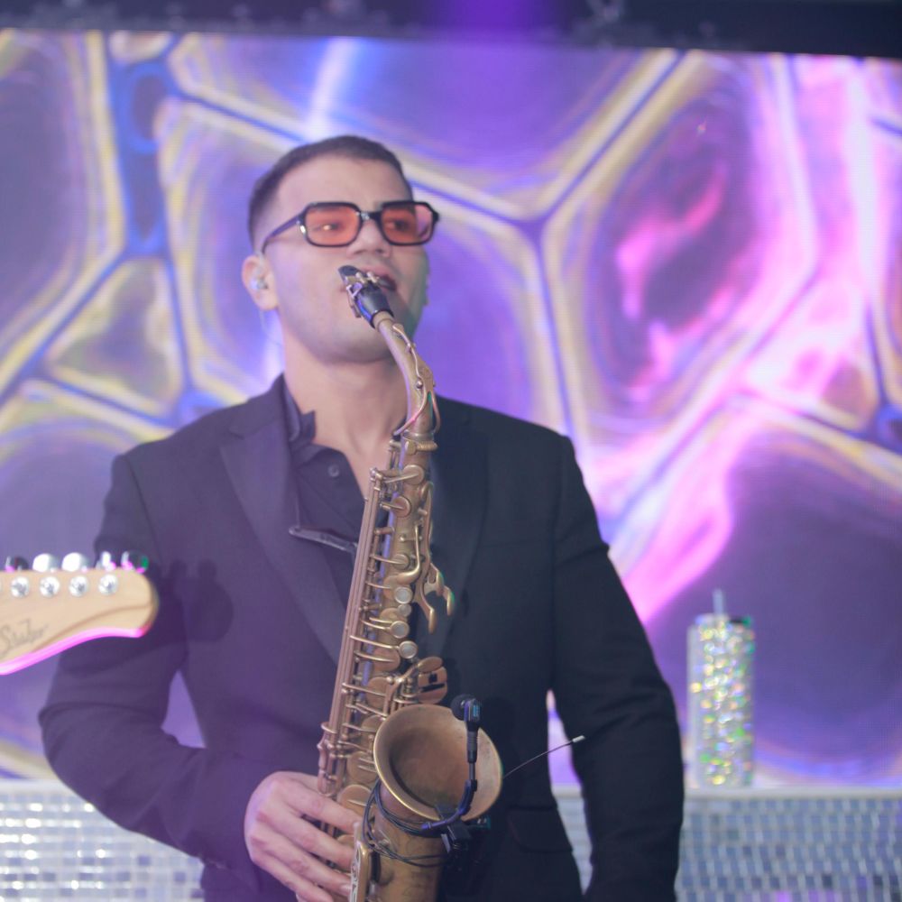 Destination wedding vocalist engaging guests