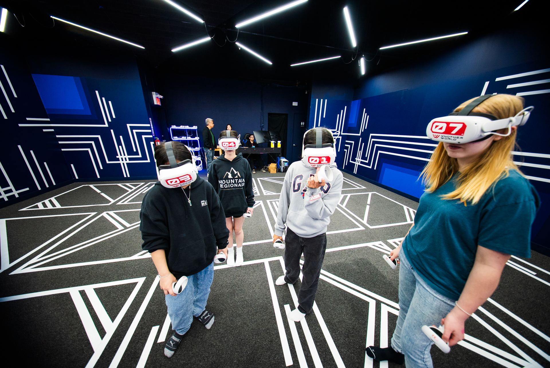 Students playing VR at Another World VR
