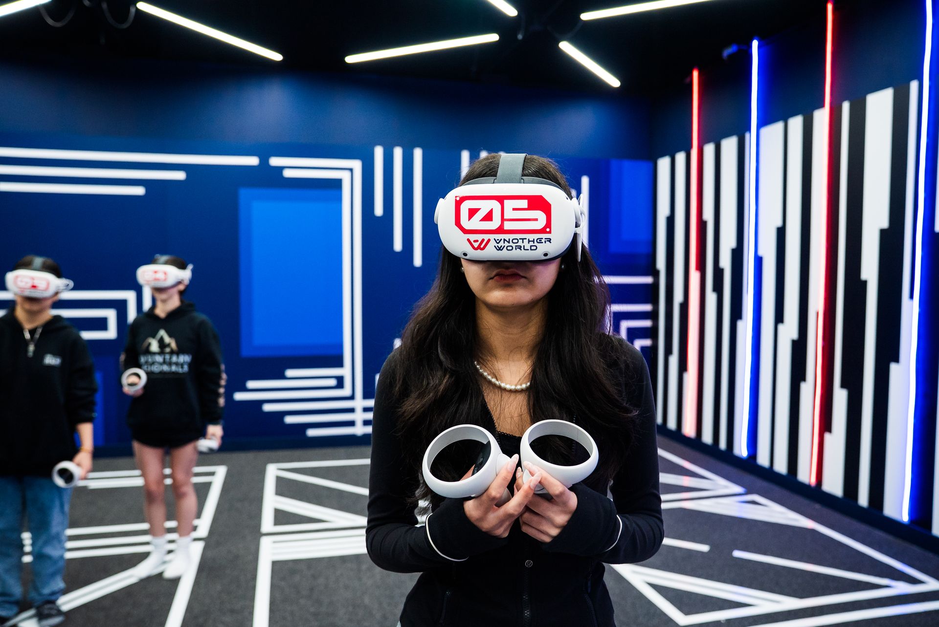 Team solving puzzles in VR