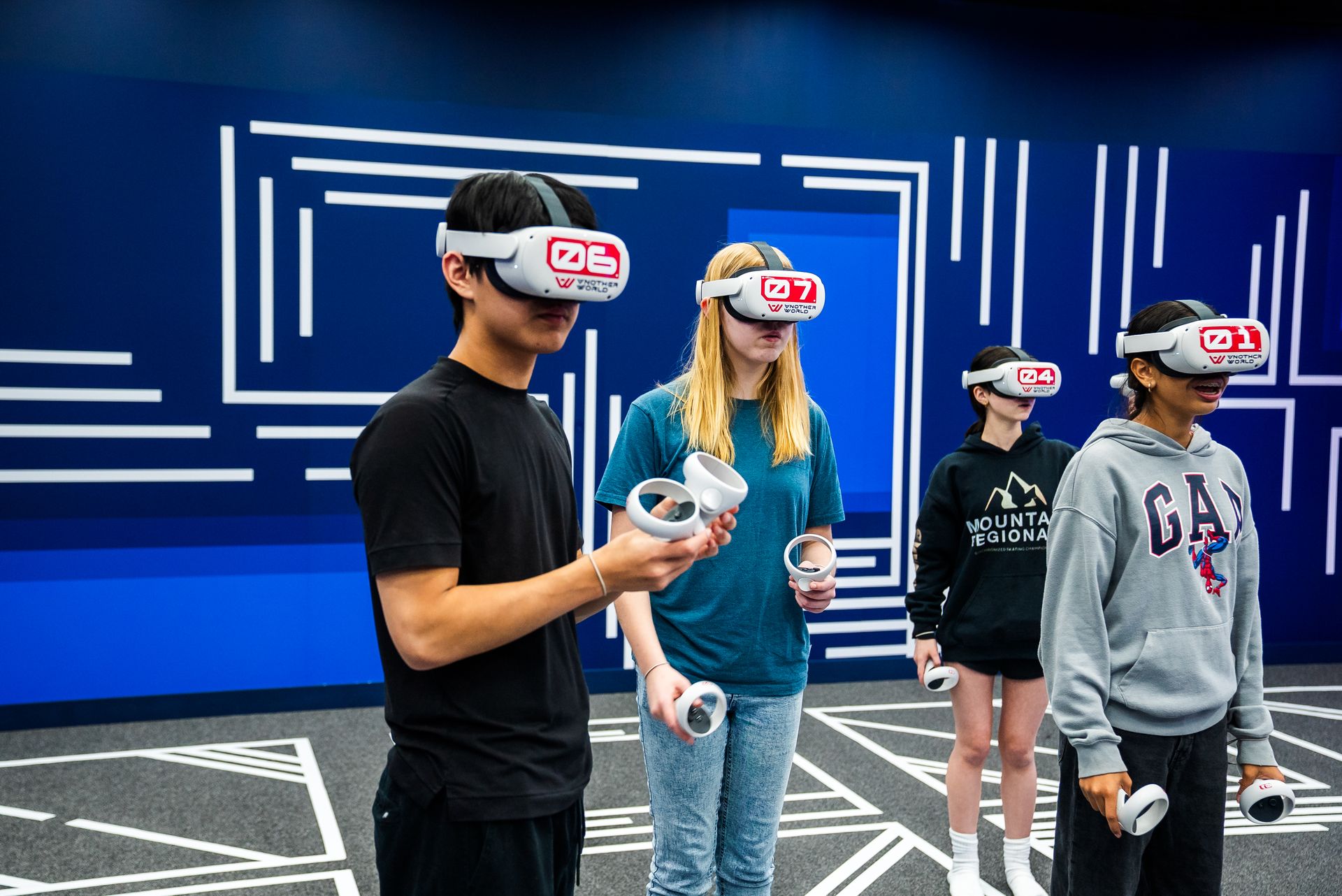 Students playing a VR escape room