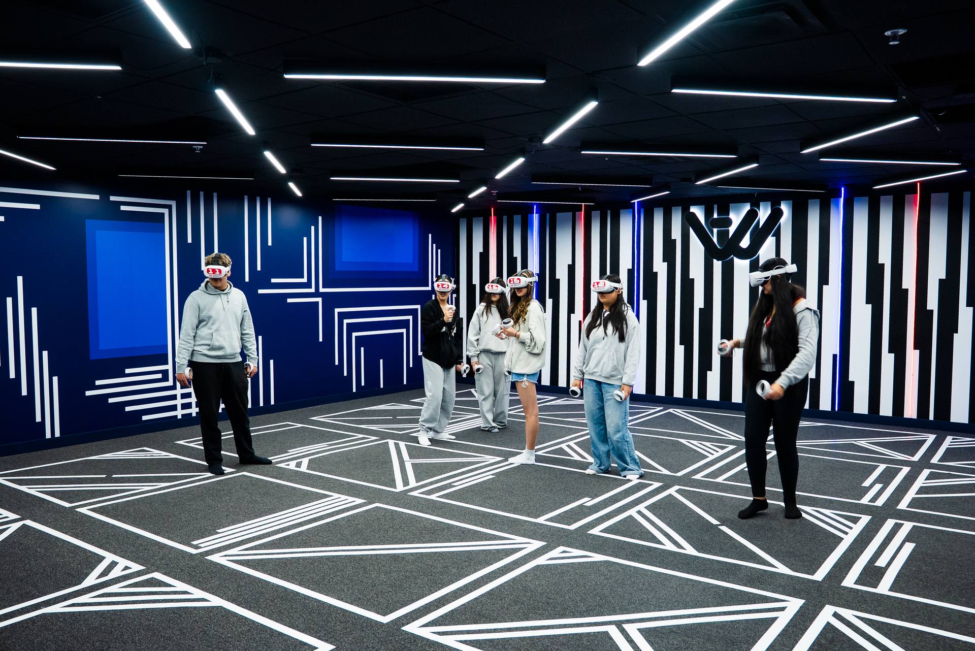 Students playing VR at Another World VR