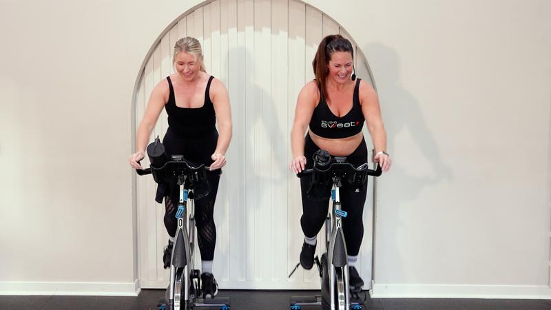 Two members cycling together