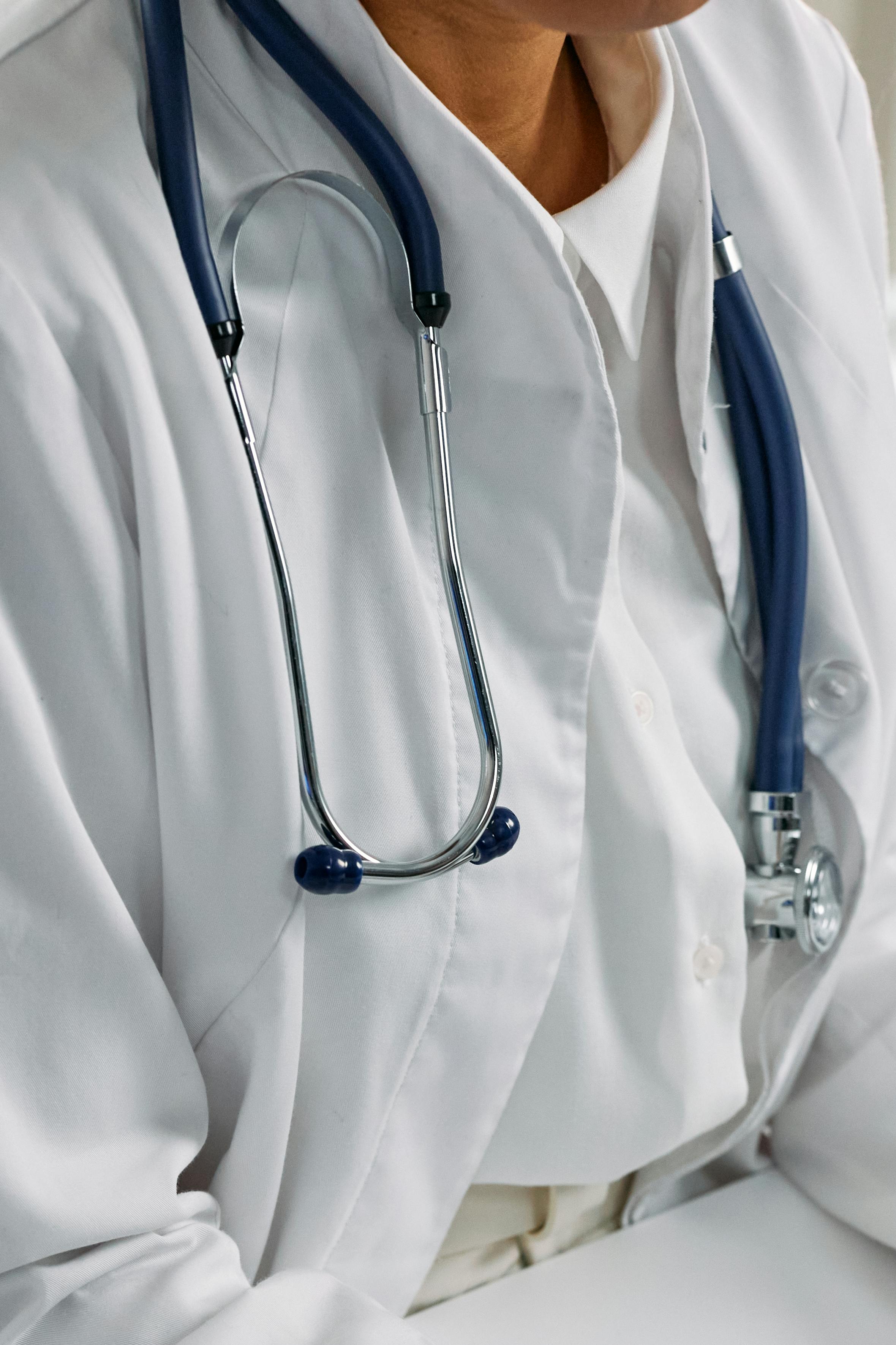 Medical professional reviewing file
