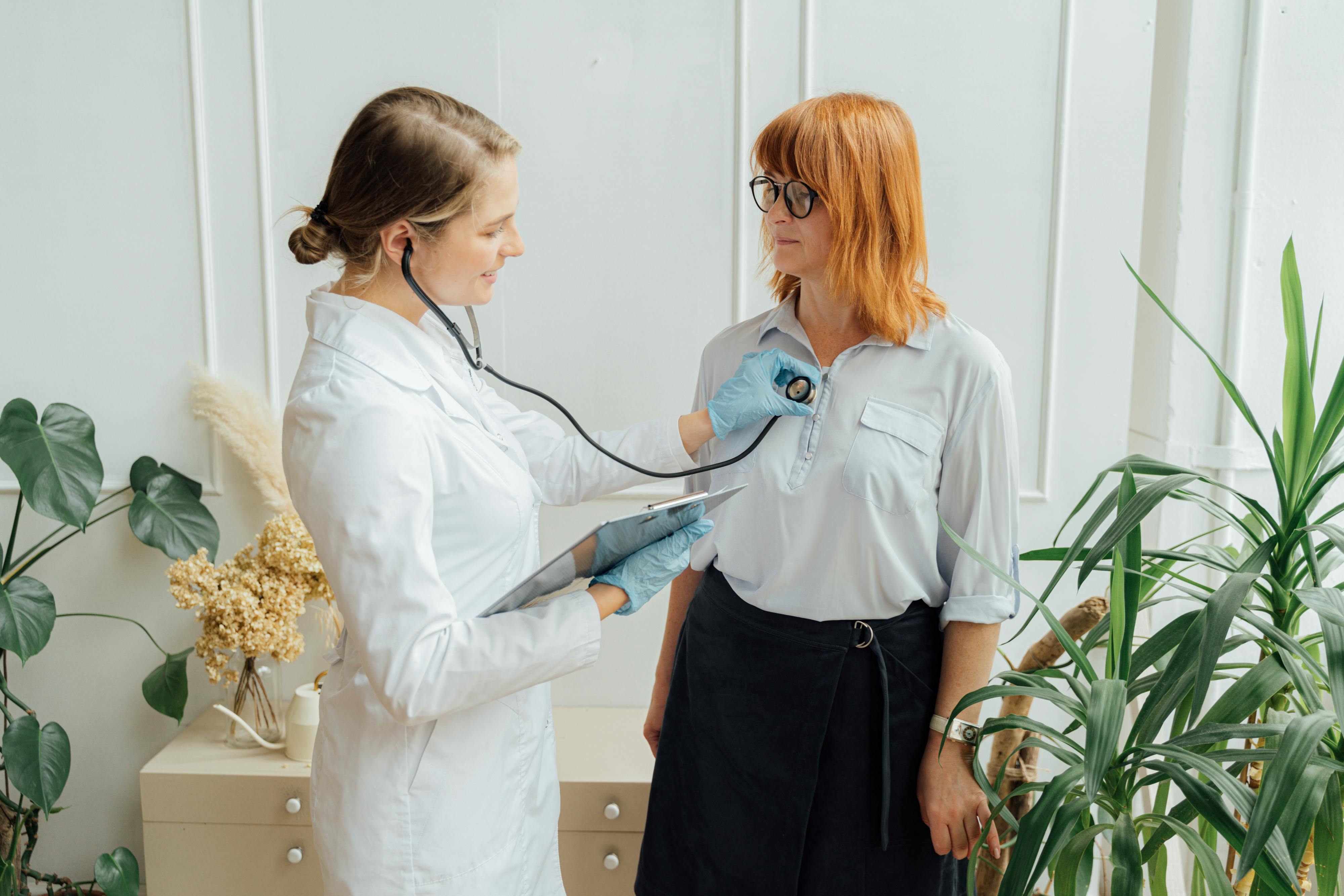 Medical professional with patient
