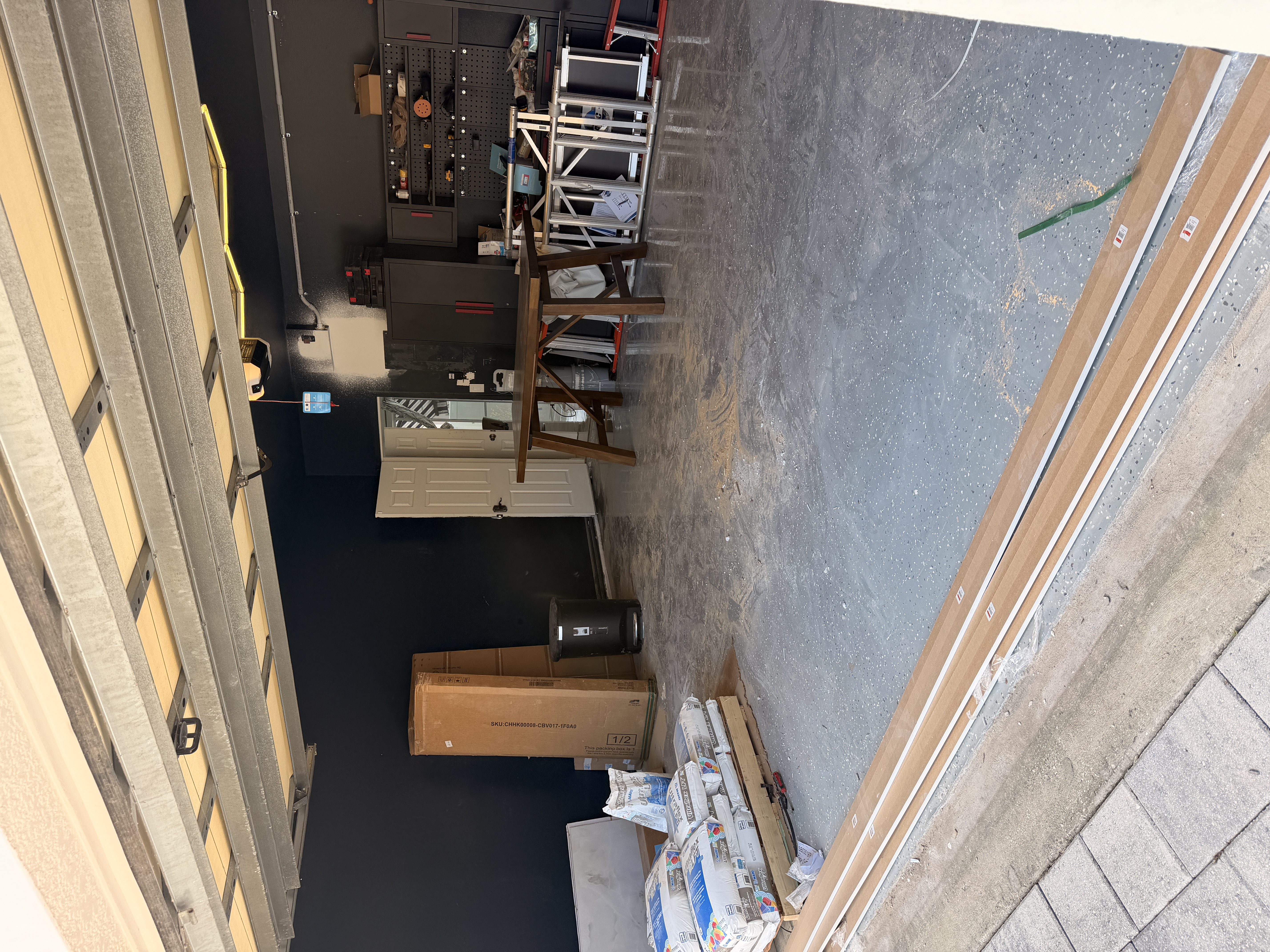 Garage in Winter Haven after cleanout with appliances, tires, and furniture hauled away