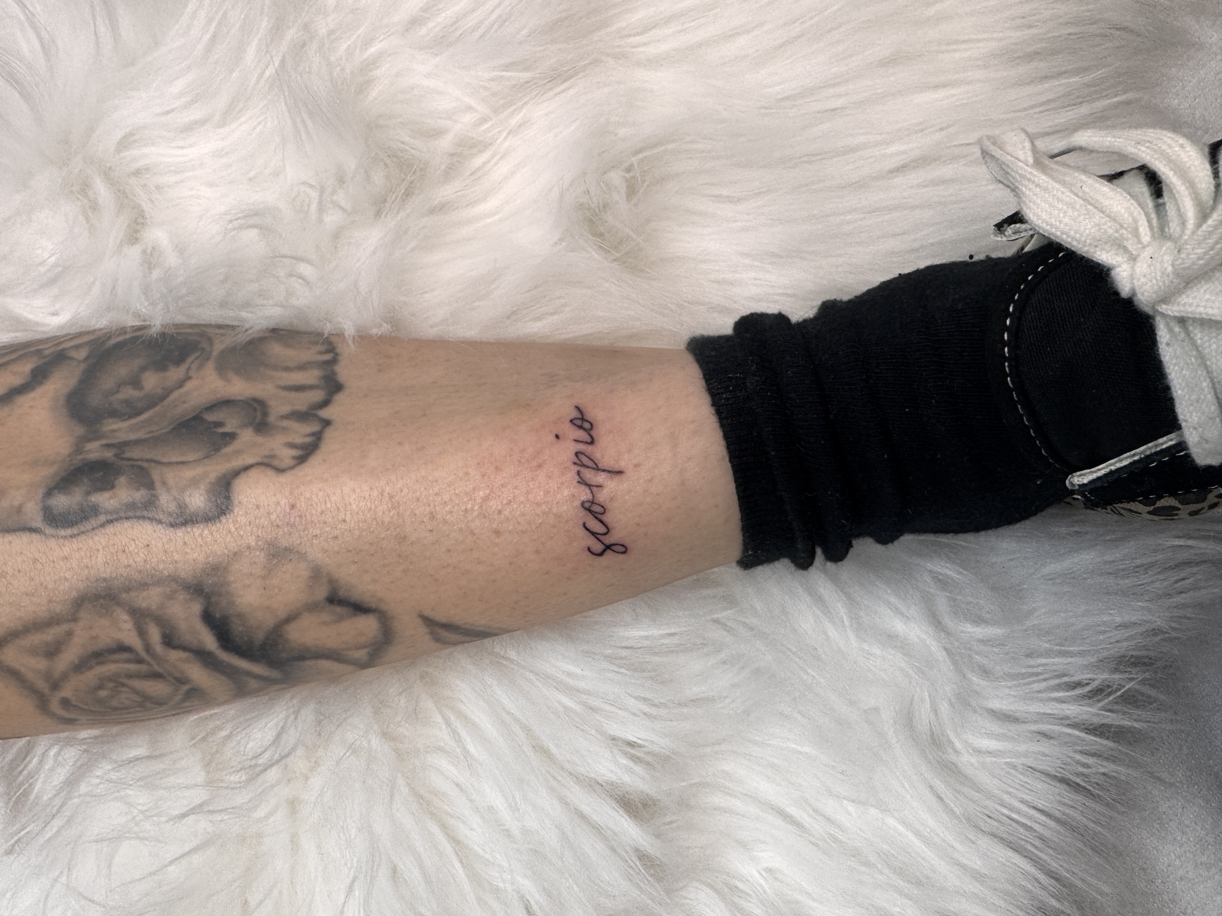 Symbolic script tattoo by XXII Ink
