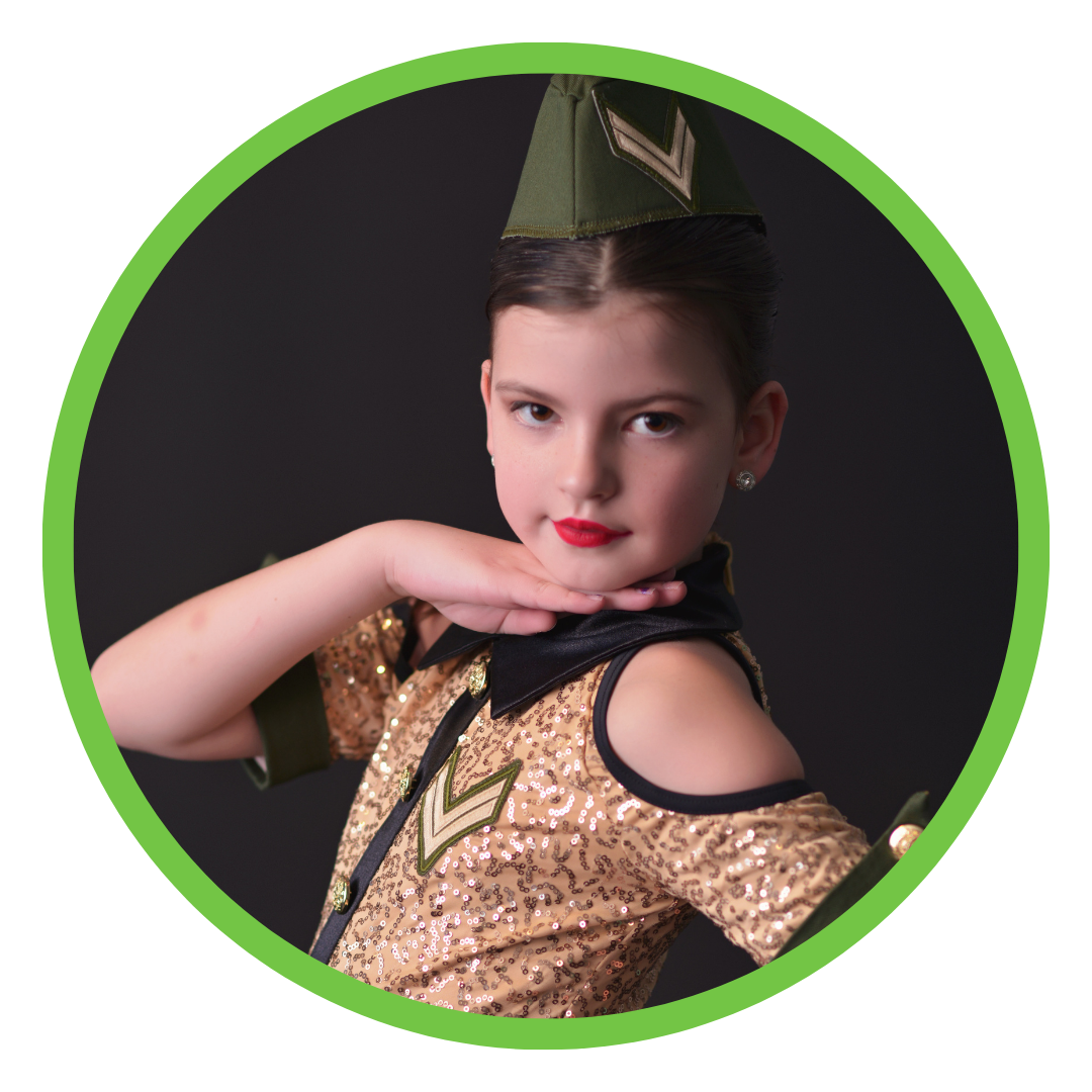 Girl with dark hair in green and gold costume