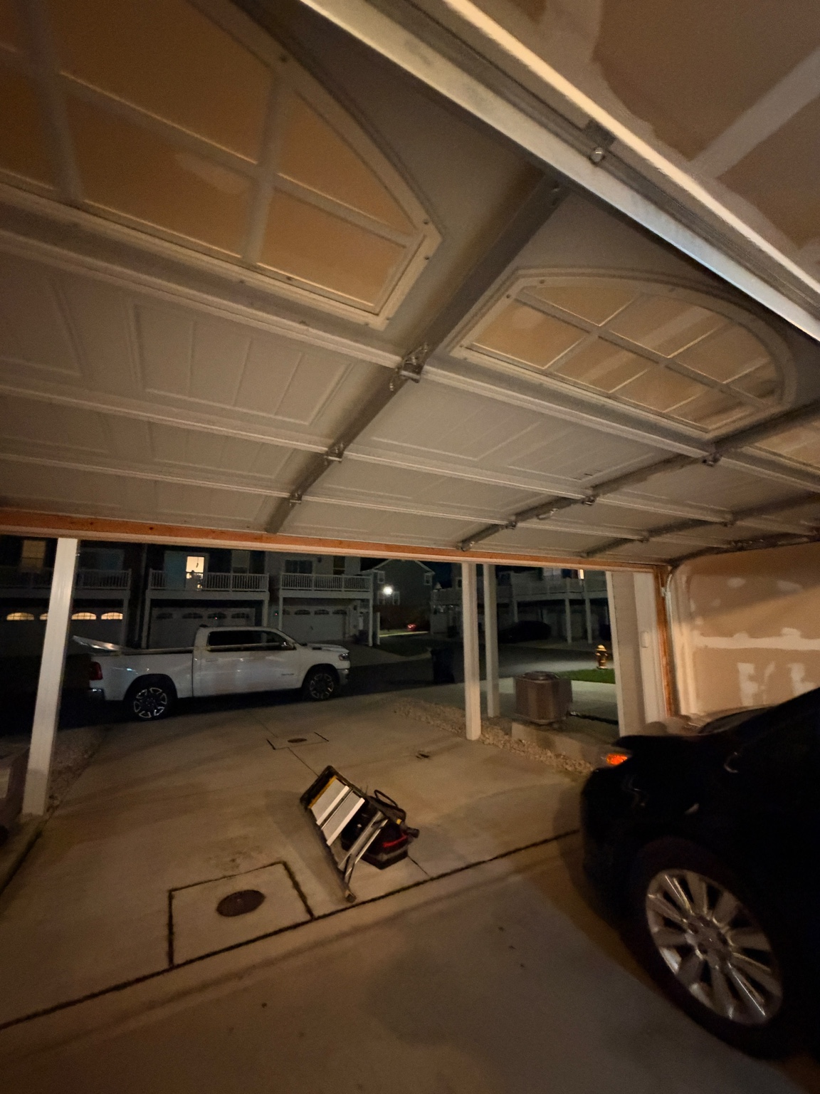 Horizontal steel reinforcing struts on an overhead garage door