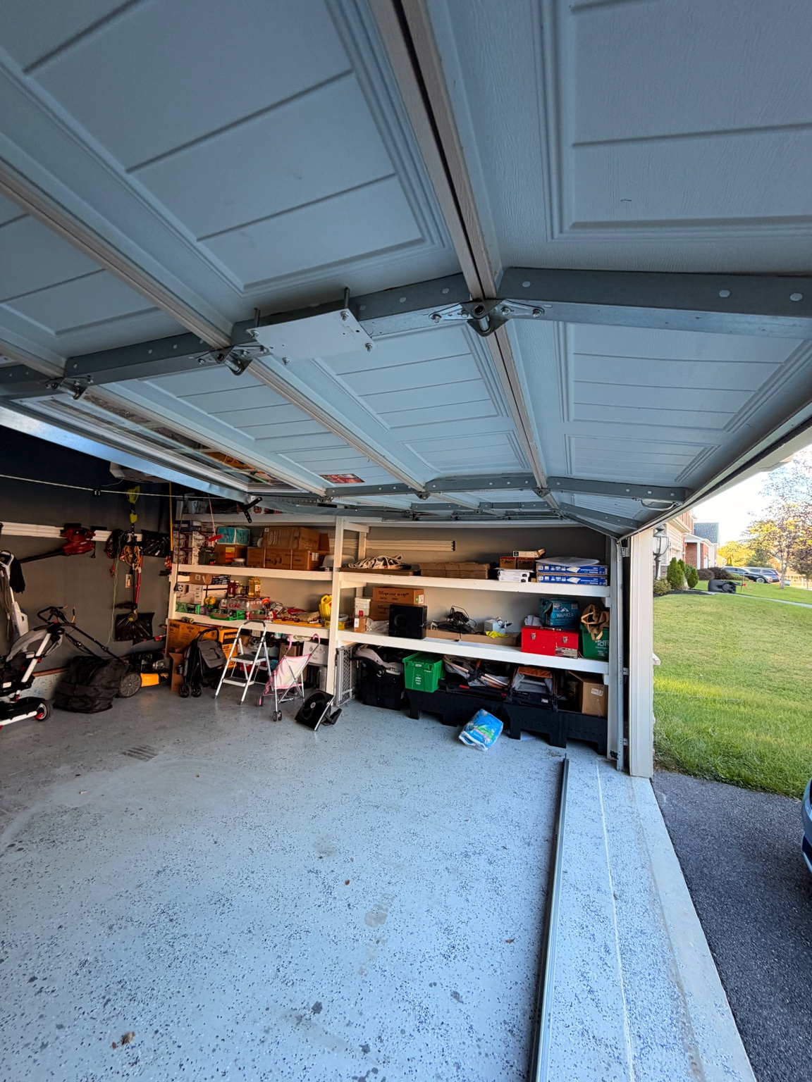 Bent panel on a raised residential garage door