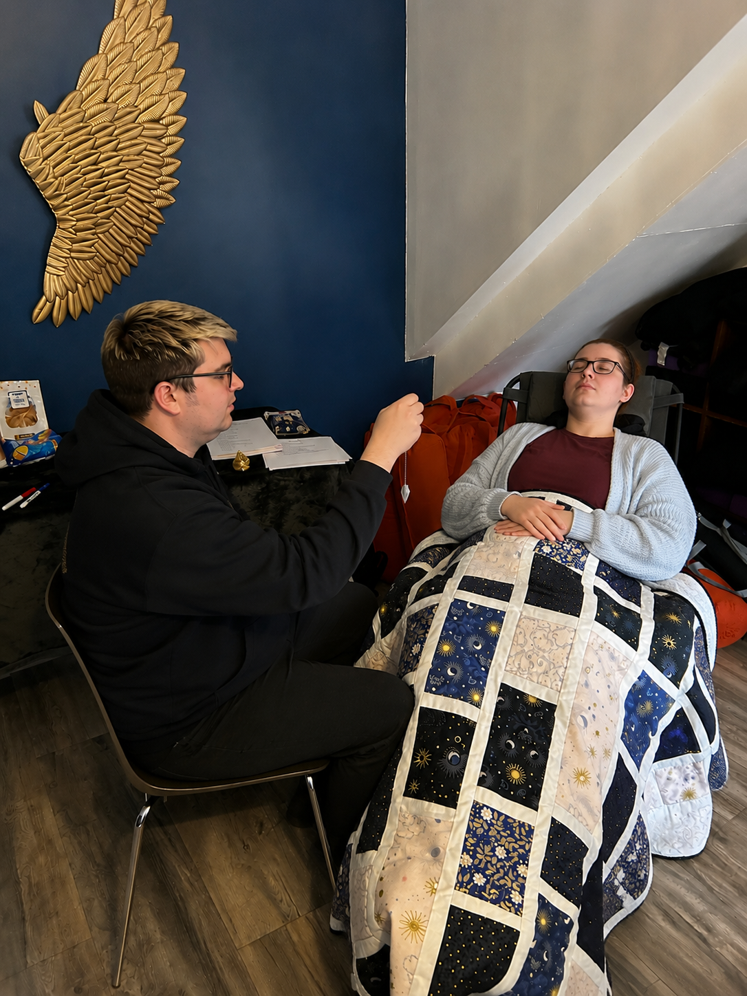 A student practising Past Life Regression facilitation during a previous Saturn Therapies practitioner training