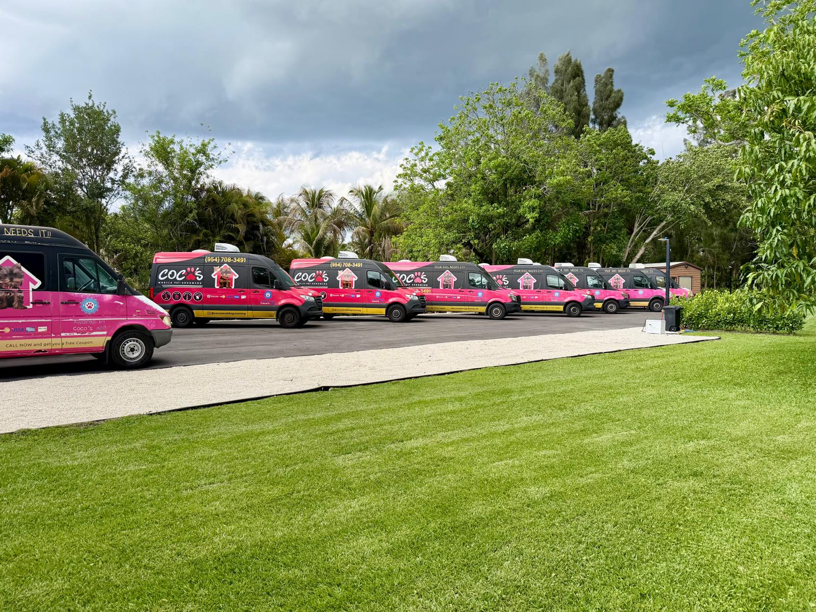 Coco's branded mobile grooming van parked outside a home in South Florida