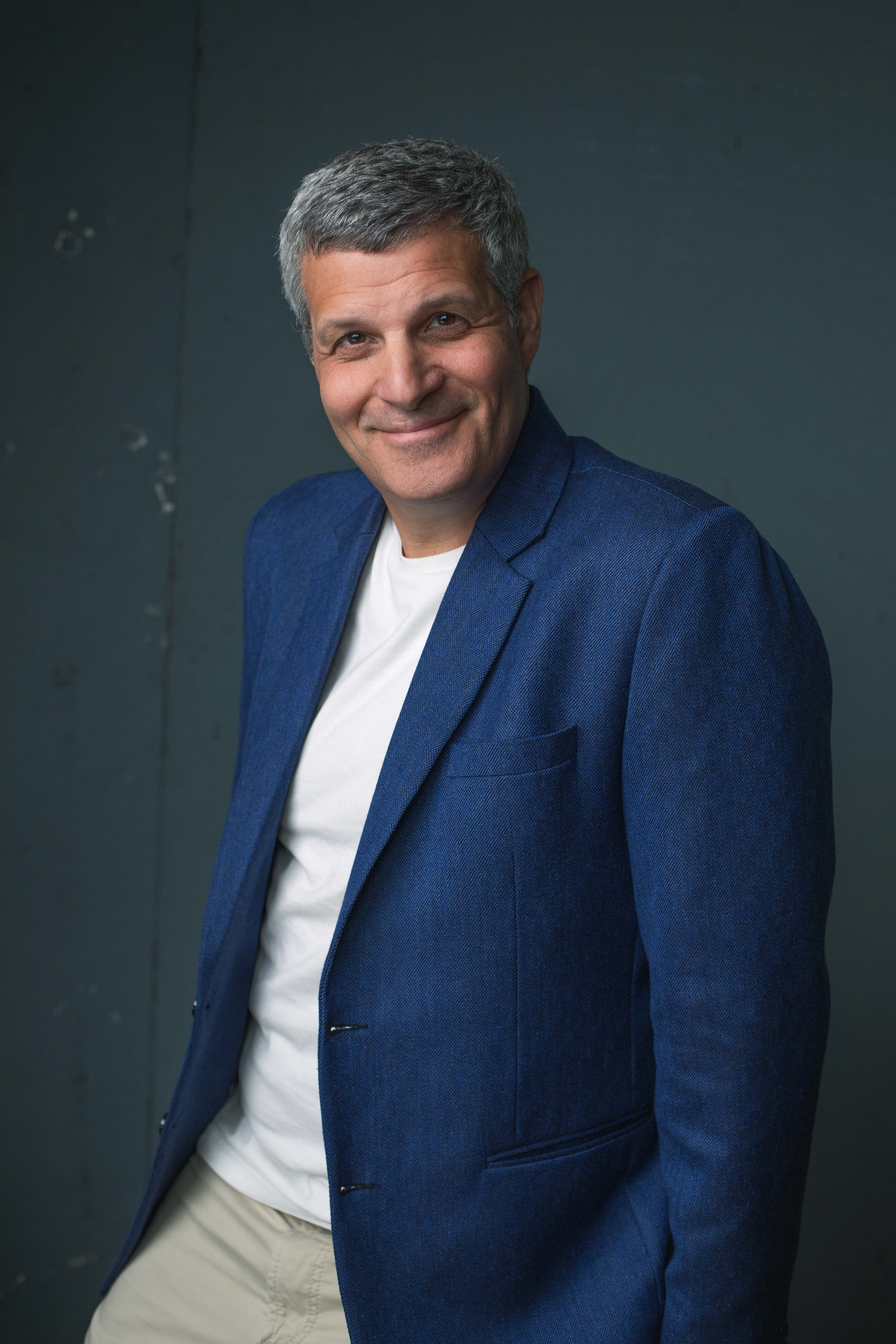 Erez Avramov headshot, blue jacket