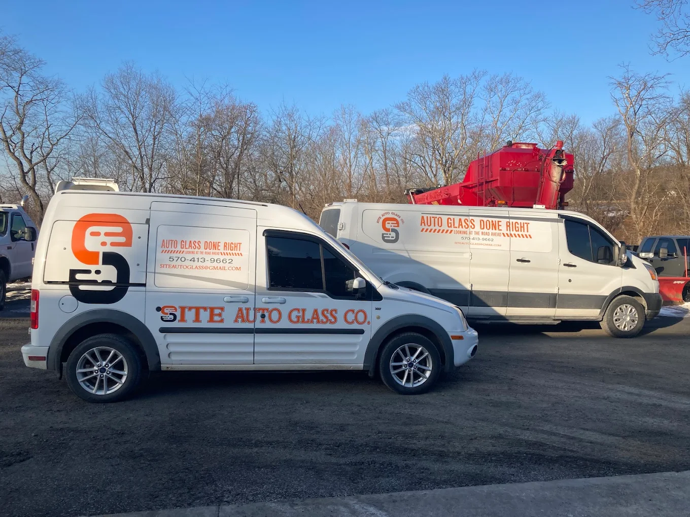 Site Auto Glass Co. fleet of branded service vans lined up at the Lehighton PA shop