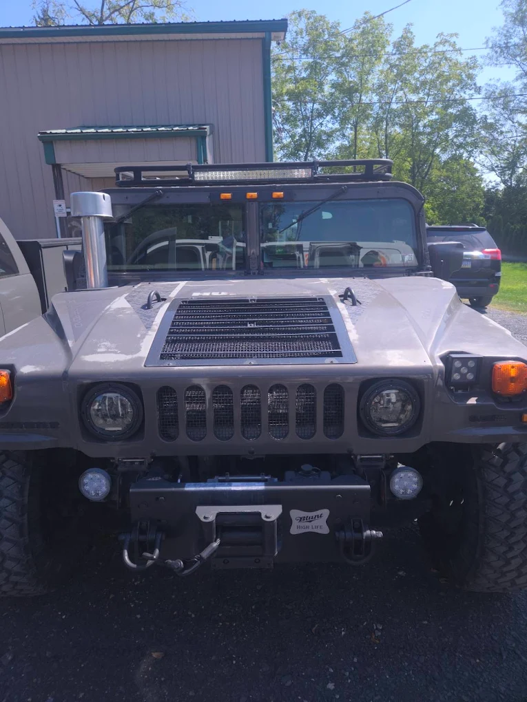 Specialty glass work on a Hummer H1 at Site Auto Glass Co.