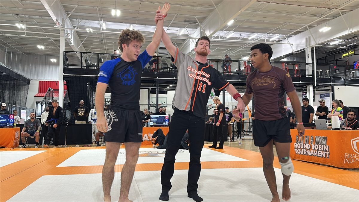 Brayden getting his hand raised after a win at Grappling Industries