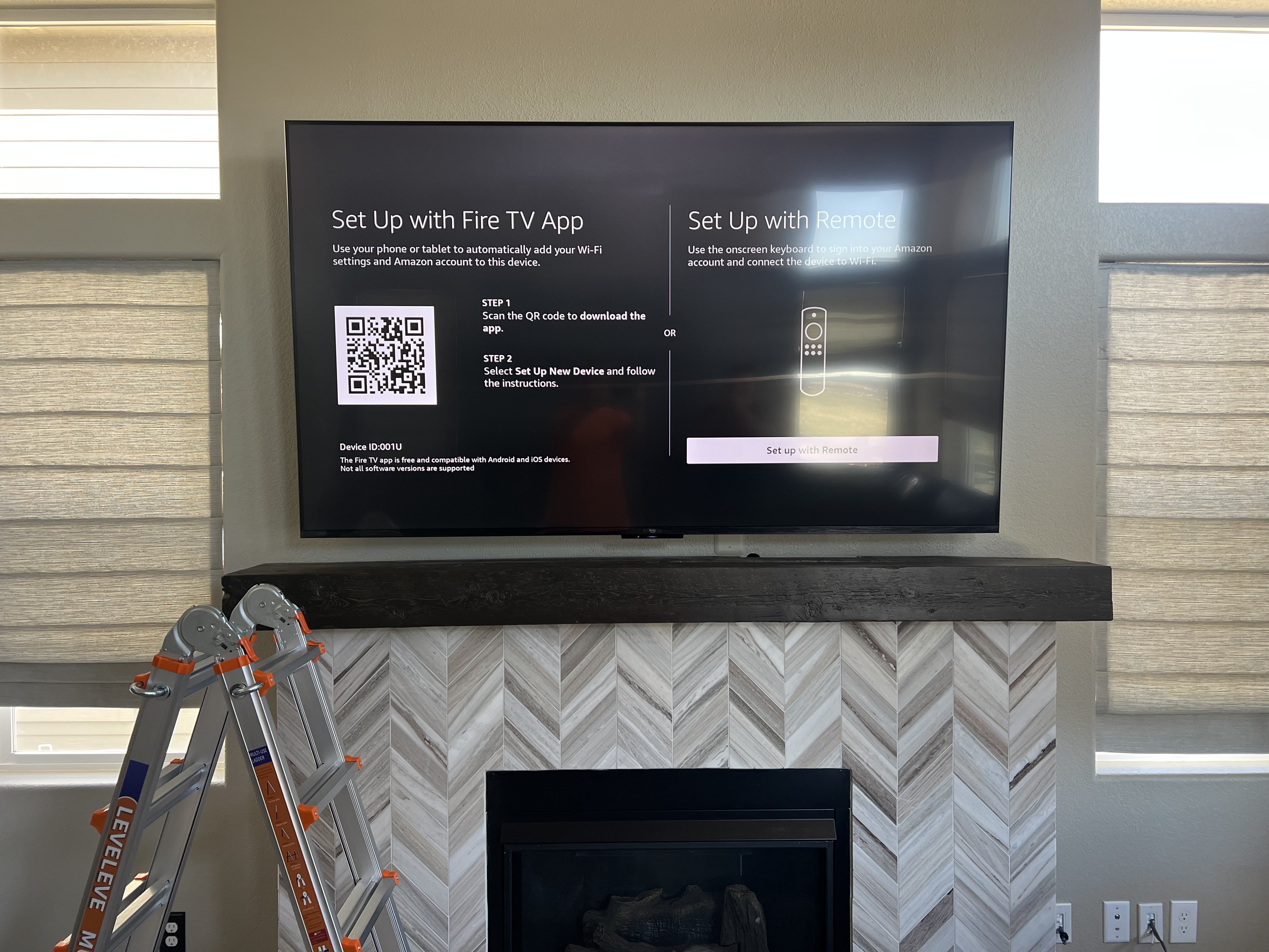 Clean above-fireplace TV mount with hidden cables by I Hang Flat Screens