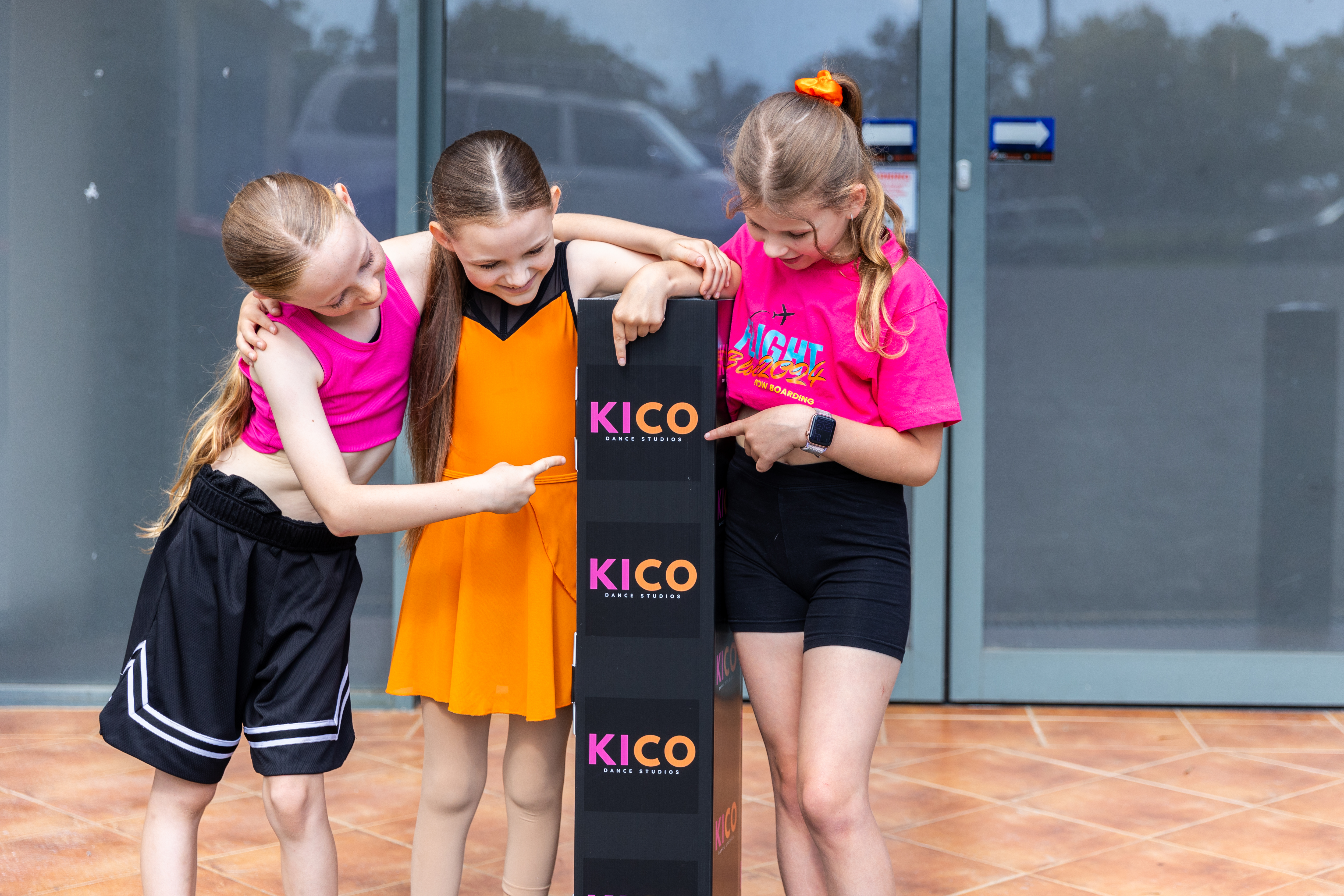 students from KICO being proud to their studio