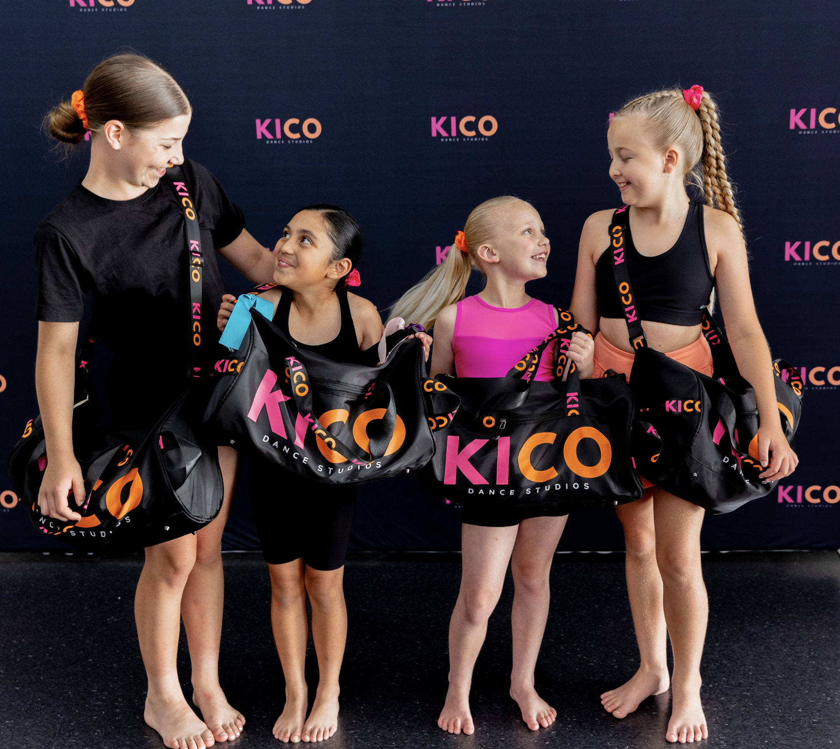group of student with their KICO merchandise