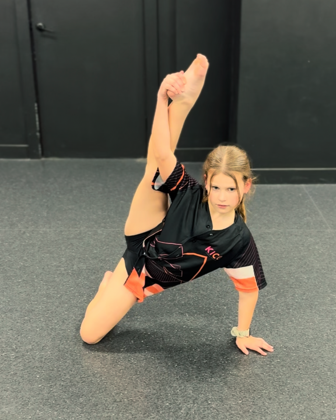 Dance student practising flexibility and control during technique training at KICO Dance Studios in Bargo NSW.