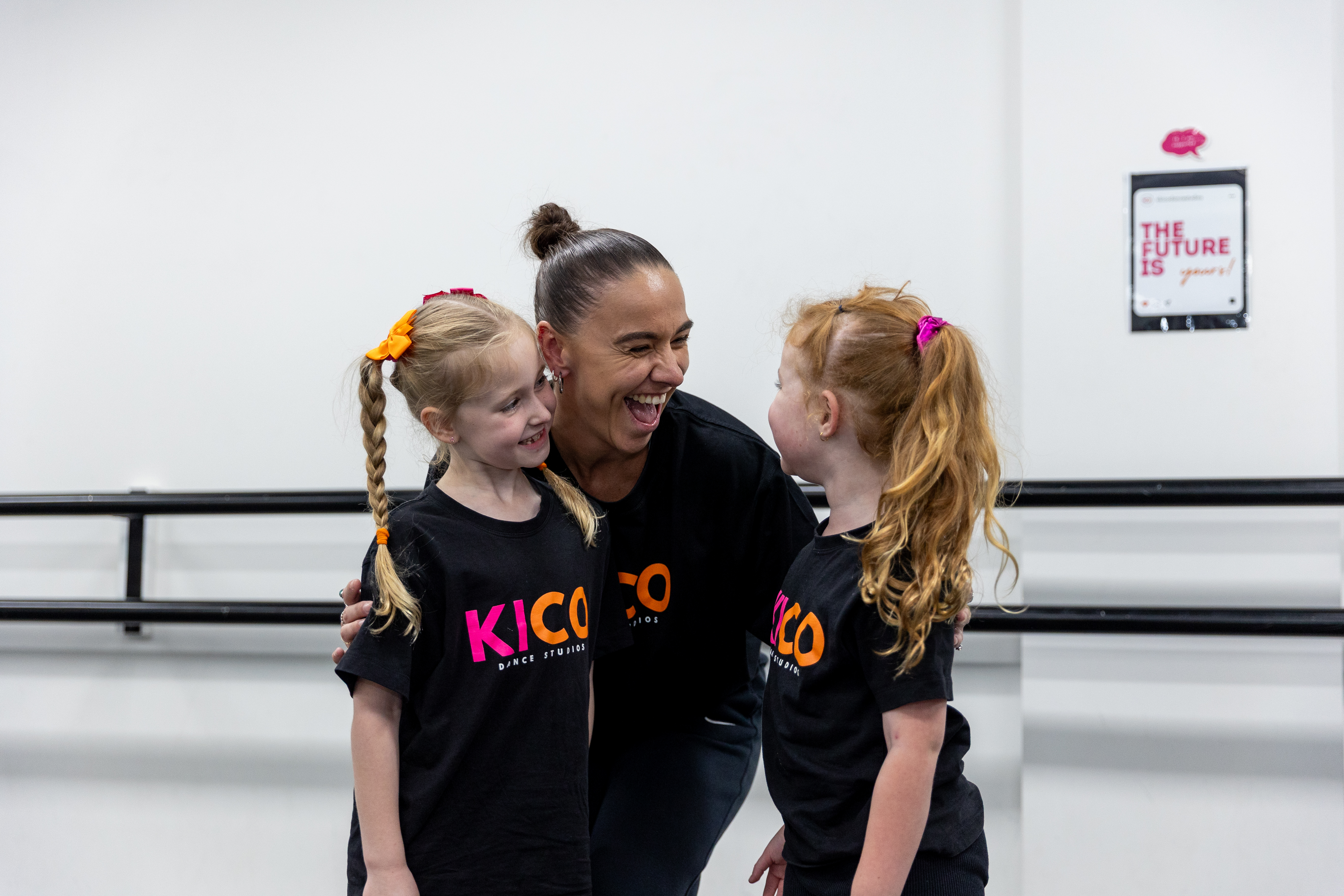 Year 2 and Year 3 students practicing acro skills with their teacher at KICO Dance Studios in Bargo, building confidence, strength, and technique through kids dance classes.