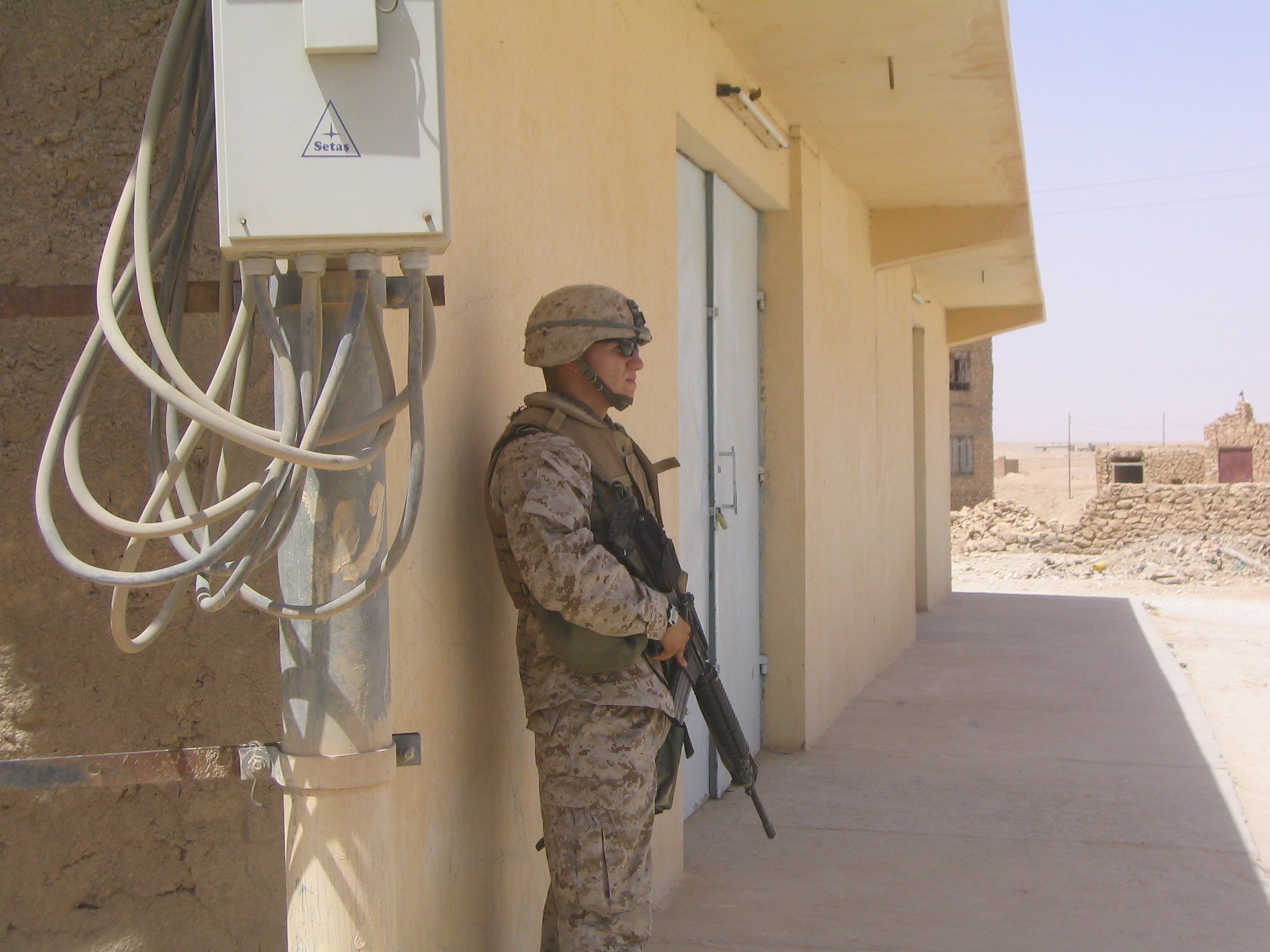 Aaron standing post in Iraq