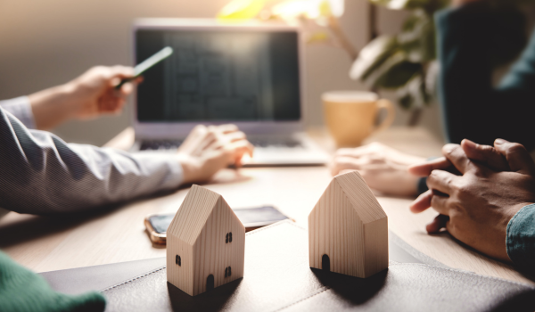 Confident home buyers reviewing property information and making informed decisions Confident home buyers reviewing property information and making informed decisions