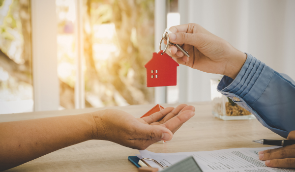 Home buyers planning strategy and working with an agent to navigate a competitive market