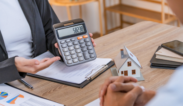Maryland Realtor reviewing home value estimates, comparable sales, and local market trends with homeowners