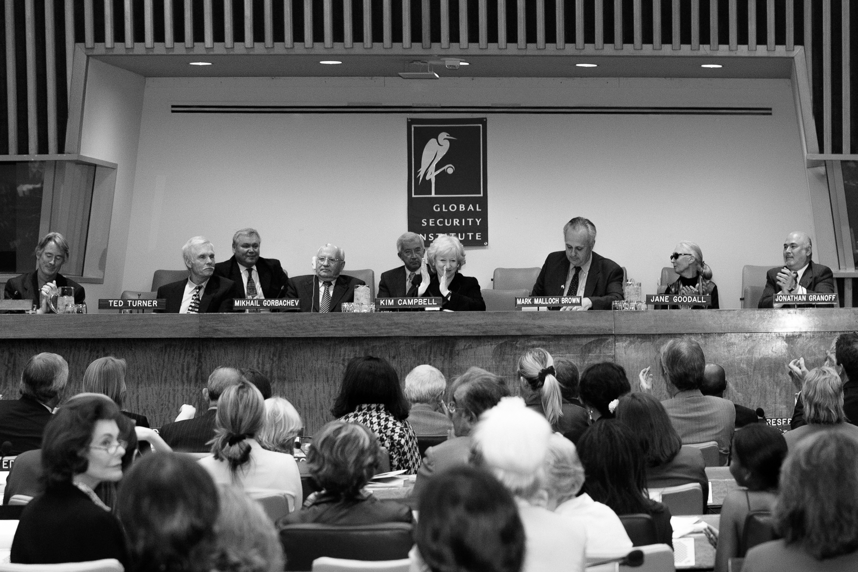 Mikhail Gorbachev, Ted Turner, Jane Goodall, Kim Campbell, Jonathan Granoff and other leaders on stage at the Global Security Institute conference at United Nations Headquarters in New York, photographed by Michael William Paul.
