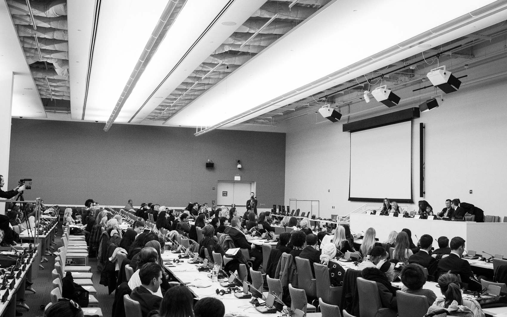 Wide view of the World Fashion Forum at United Nations Headquarters on International Women’s Day, directed and produced by Michael William Paul with Models for Peace, showing the full room of diplomats, fashion leaders, and partners gathered around women’s rights and the SDGs.
