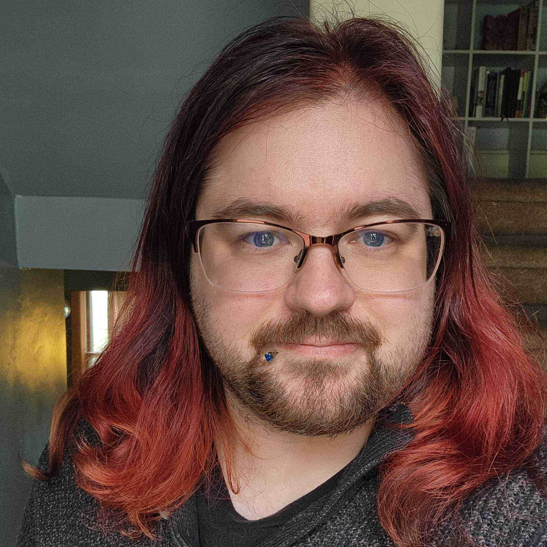 Artemis Quinn (he/they), also known as Vamp or VampireAntihero on social media, is a nonbinary artist and author based in Oshkosh, WI. They're a fulltime freelance artist, and their work is a comic semi-realistic style. Their work — art and writing both — is largely focused in dark fantasy, horror, and supernatural elements; shedding light on topics such as mental health, LGBTQIA+ experiences, and isolation. He also acts in a local theatre troupe on a volunteer basis. It is his goal to work on stories that can bring meaningful change to the world. He spends his time, writing, drawing, hiking, or communing with the unspeakable horrors of the void.