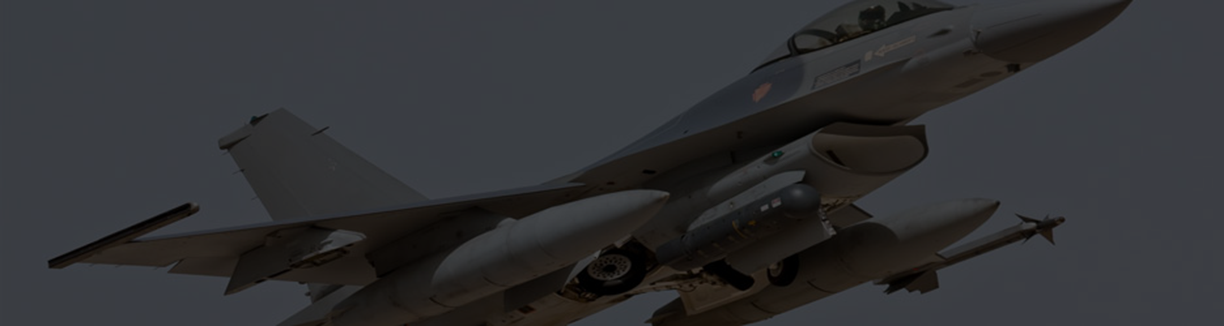 Military jet aircraft in flight.