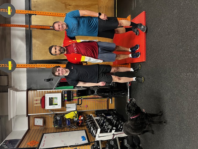 Empower members celebrating workout with beautiful dog Empower members celebrating workout with beautiful dog