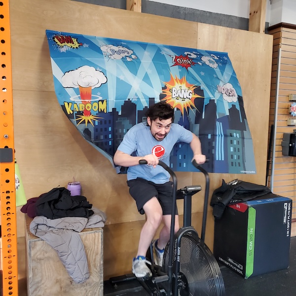 Empower athlete on the bike during CrossFit Open intramurals Empower athlete on the bike during CrossFit Open intramurals