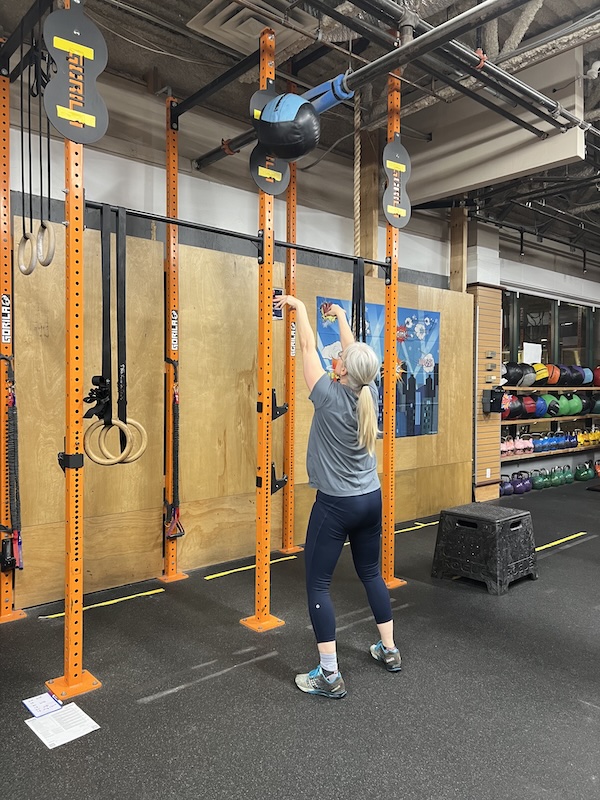Empower athlete doing a wall ball throw