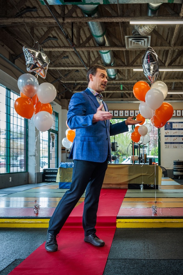 Coach WOD Father speaking at the Empower awards gala 2026