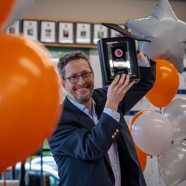 Doc Disk receiving his award for 2000+ classes