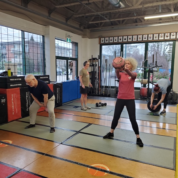 Kettlebell swings at Empower Fitness on Alma Street