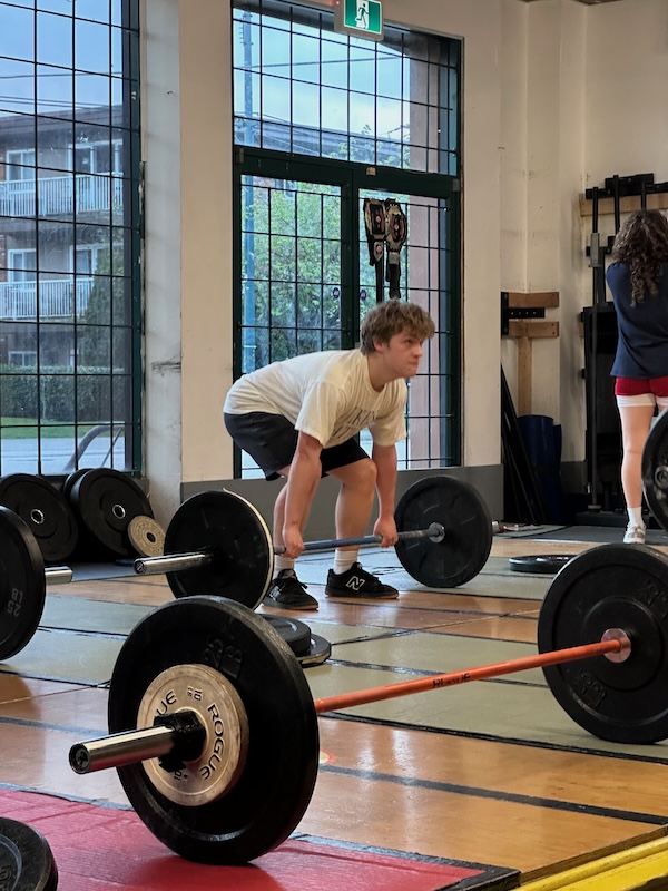 Empower athlete performing a deadlift