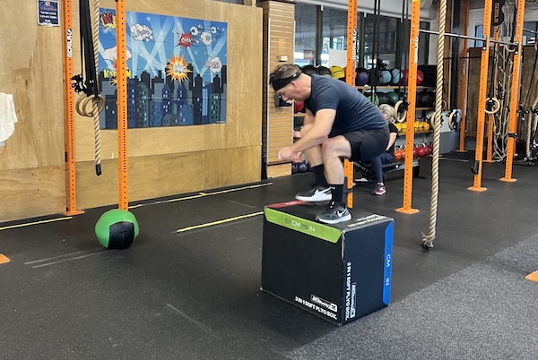 Empower member Maui doing a box jump