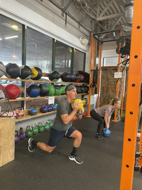 Kettlebell lunges at Empower Kettlebell lunges at Empower