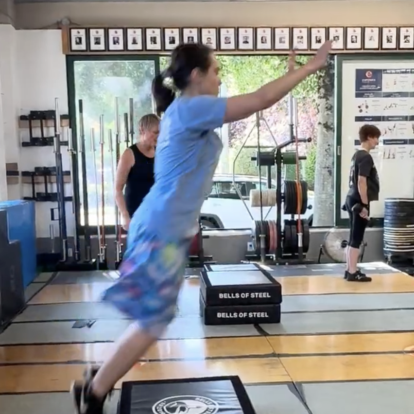 Member doing a box jump over
