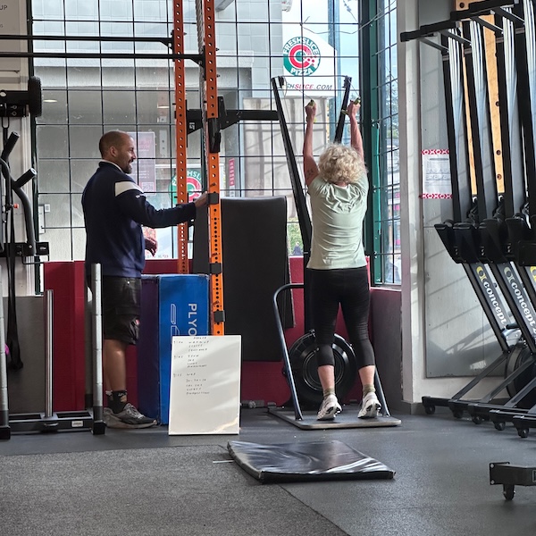 Empower member doing personal training with Coach Leon