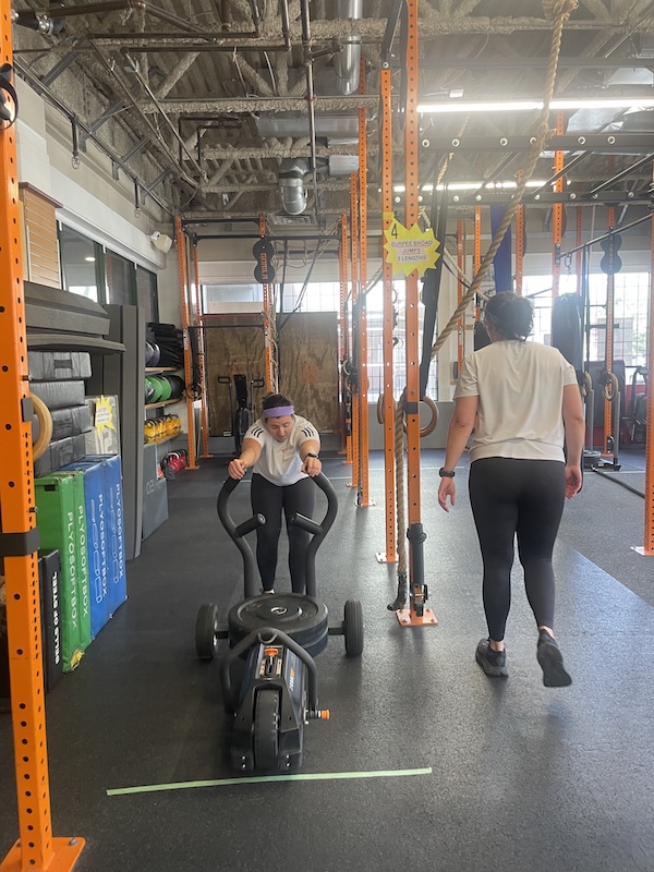 Sled push at the HYROX Half Sim