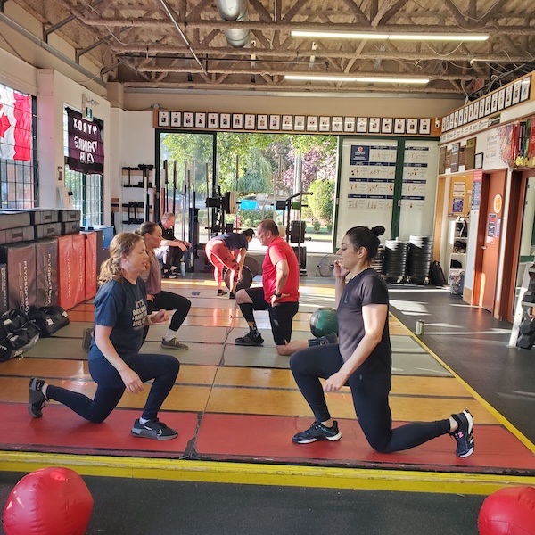 Lunges on the platform at Empower Lunges on the platform at Empower