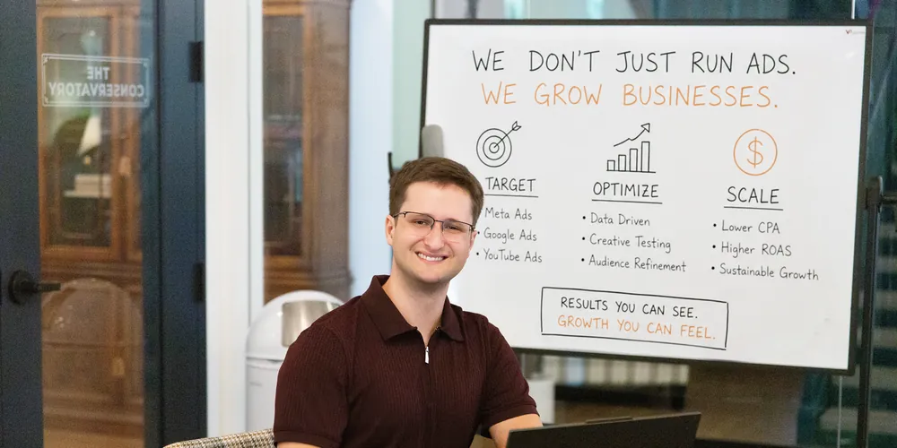 Sam Ackerman at a whiteboard headed we grow businesses, with columns for target, optimize and scale
